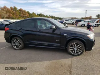 2016 BMW X4 xDrive28i with VIN 5UXXW3C55G0R22729, listed as a Copart auction lot 72906833 with 98,668 mi miles. Bid and sale history available at carsss.com. Image 4.