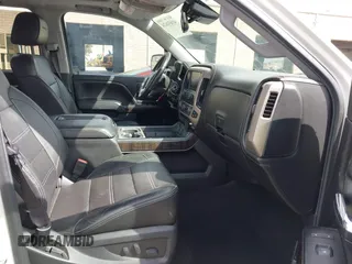 2014 GMC Sierra 1500 Denali z VIN 3GTU2WEJ3EG551266, wystawiony jako IAAI lot #41631624 z przebiegiem 120 214 mil mil oraz . Historia ofert i sprzedaży dostępna na DreamBid. Obrazek 5.