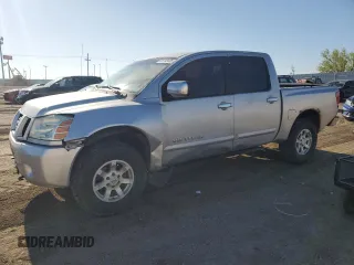 2007 Nissan Titan SE z VIN 1N6BA07B67N224669, wystawiony jako Copart lot #55732435 z przebiegiem 197 265 mil mil oraz Szkoda całkowita • Salvage title. Historia ofert i sprzedaży dostępna na DreamBid. Obrazek 1.