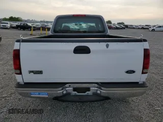 1998 Ford F-150 with VIN 1FTZX17W2WKB25677, listed as a Copart auction lot 54419145 with 319,584 mi miles and Salvage title. Bid and sale history available at DreamBid. Image 6.
