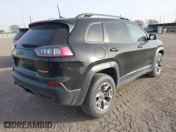 2019 Jeep Cherokee Trailhawk Elite with VIN 1C4PJMBX4KD385796, listed as a IAAI auction lot 41557577 with 55,700 mi miles. Bid and sale history available at carsss.com. Image 4.