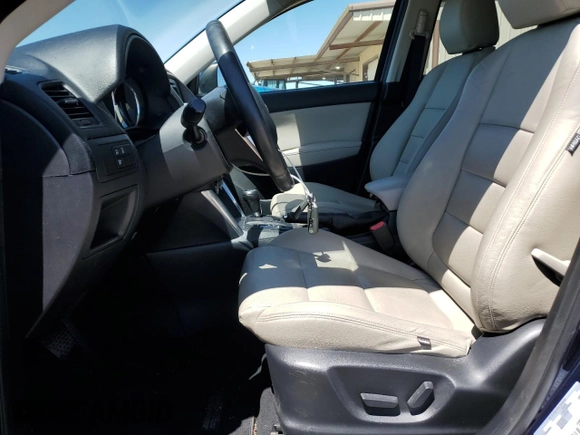 2014 Mazda CX-5 Touring with VIN JM3KE2CY7E0362879, listed as a Copart auction lot 53079545 with 70,863 mi miles and Salvage Title. Bid and sale history available at carsss.com. Image 7.