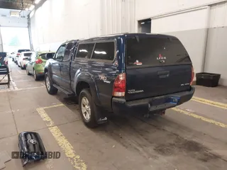 2006 Toyota Tacoma with VIN 5TEUU42N06Z265256, listed as a IAAI auction lot 41371660 with 153,557 mi miles. Bid and sale history available at carsss.com. Image 3.