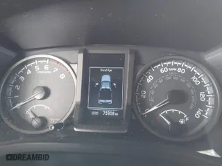 2019 Toyota Tacoma 4WD SR with VIN 3TMCZ5ANXKM225066, listed as a IAAI auction lot 41825265 with 75,908 mi miles. Bid and sale history available at carsss.com. Image 7.