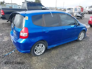 2007 Honda Fit Sport z VIN JHMGD38677S060383, wystawiony jako IAAI lot #41570104 z przebiegiem 213 350 mil mil oraz . Historia ofert i sprzedaży dostępna na DreamBid. Obrazek 4.