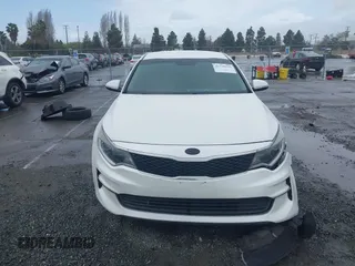 2016 Kia Optima LX with VIN 5XXGT4L30GG049534, listed as a IAAI auction lot 41770579 with 94,257 mi miles. Bid and sale history available at carsss.com. Image 13.