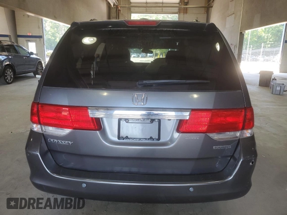 2010 Honda Odyssey Touring with VIN 5FNRL3H91AB113770, listed as a Copart auction lot 61893115 with 155,776 mi miles and Salvage title. Bid and sale history available at DreamBid. Image 6.