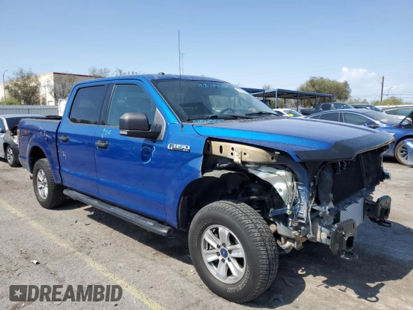 2018 Ford F-150 XL with VIN 1FTEW1EGXJKD26409, listed as a Copart auction lot 59403645 with 122,373 mi miles and Salvage title. Bid and sale history available at DreamBid. Image 4.