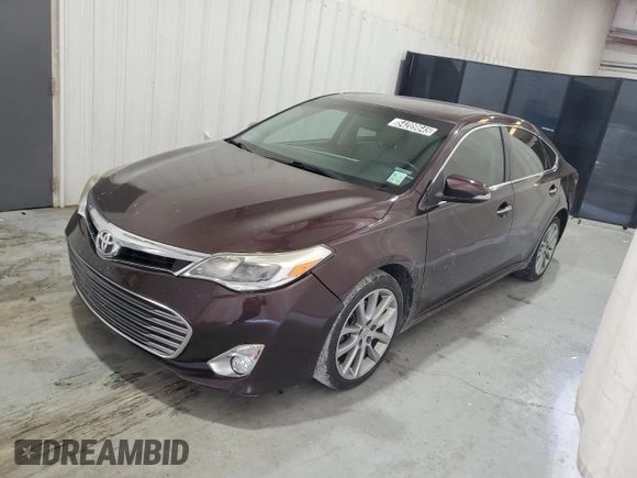 2014 Toyota Avalon Limited z VIN 4T1BK1EB6EU077986, wystawiony jako Copart lot #54209645 z przebiegiem 121 685 mil mil oraz Czysty tytuł • Clean title. Historia ofert i sprzedaży dostępna na DreamBid. Obrazek 1.