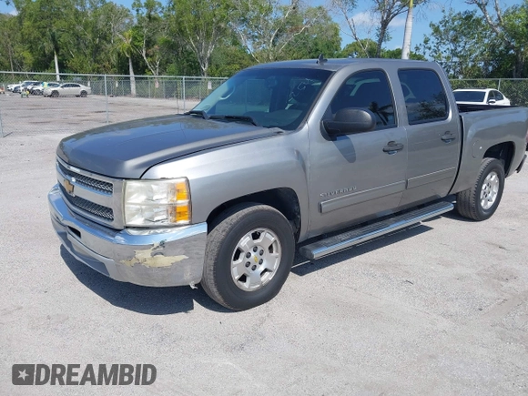 2013 Chevrolet Silverado 1500 LT with VIN 3GCPCSE01DG206827, listed as a IAAI auction lot 41976945 with 213,940 mi miles and . Bid and sale history available at DreamBid. Image 2.