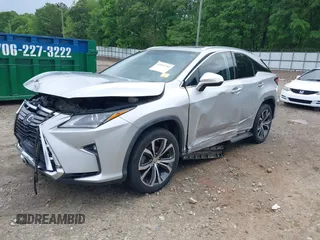 2016 Lexus RX 350 z VIN 2T2ZZMCA5GC002315, wystawiony jako IAAI lot #42107312 z przebiegiem 156 339 mil mil oraz . Historia ofert i sprzedaży dostępna na DreamBid. Obrazek 2.