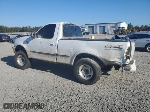 1998 Ford F-150 with VIN 1FTZF18W3WNB98041, listed as a Copart auction lot 77530824 with 194,712 mi miles and Salvage title. Bid and sale history available at DreamBid. Image 2.