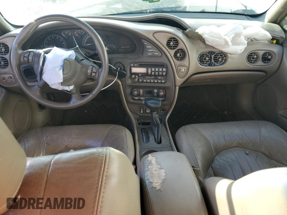 2002 Pontiac Bonneville SLE z VIN 1G2HY54K824158784, wystawiony jako Copart lot #74749224 z przebiegiem Nie podano mil oraz Szkoda całkowita • Salvage title. Historia ofert i sprzedaży dostępna na DreamBid. Obrazek 8.