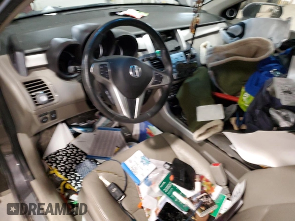 2009 Acura RDX Technology z VIN 5J8TB18549A005000, wystawiony jako Copart lot #48540105 z przebiegiem Nie podano mil oraz Szkoda całkowita • Salvage title. Historia ofert i sprzedaży dostępna na DreamBid. Obrazek 8.