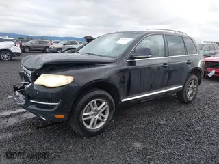 2009 Volkswagen Touareg 2 VR6 with VIN WVGBE77L29D010730, listed as a IAAI auction lot 41109415 with 230,325 mi miles. Bid and sale history available at carsss.com. Image 2.