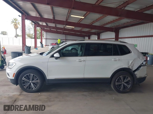 2019 Volkswagen Tiguan SE with VIN 3VV3B7AXXKM055925, listed as a IAAI auction lot 42019778 with 75,654 mi miles and . Bid and sale history available at DreamBid. Image 14.