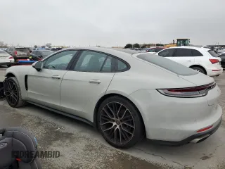 2021 Porsche Panamera с VIN WP0AJ2A75ML120017, выставлен на аукционе Copart как лот 81517913 с пробегом 26 083 миль миль и . История ставок и продаж доступна на DreamBid. Изображение 2.
