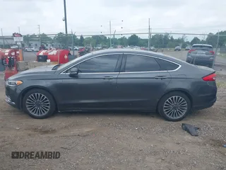 2017 Ford Fusion SE with VIN 3FA6P0T9XHR186017, listed as a IAAI auction lot 42535725 with 166,794 mi miles and . Bid and sale history available at DreamBid. Image 14.
