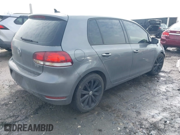 2012 Volkswagen Golf TDI with VIN WVWDM7AJ1CW205186, listed as a IAAI auction lot 41468253 with 150,991 mi miles and . Bid and sale history available at DreamBid. Image 4.