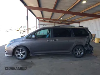 2015 Toyota Sienna SE with VIN 5TDXK3DC1FS667924, listed as a IAAI auction lot 42062805 with 123,504 mi miles. Bid and sale history available at carsss.com. Image 14.