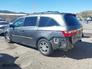 2011 Honda Odyssey EX-L with VIN 5FNRL5H68BB092628, listed as a IAAI auction lot 41820351 with 243,538 mi miles. Bid and sale history available at carsss.com. Image 3.