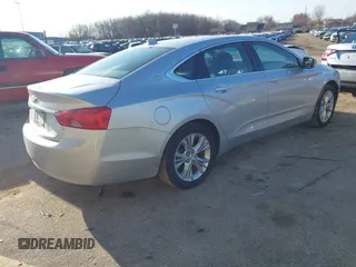 2014 Chevrolet Impala LT with VIN 1G1115SL1EU112255, listed as a IAAI auction lot 41753176 with 69,583 mi miles and . Bid and sale history available at DreamBid. Image 4.