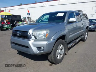 2014 Toyota Tacoma with VIN 3TMLU4EN7EM146705, listed as a IAAI auction lot 41949827 with 147,887 mi miles and . Bid and sale history available at DreamBid. Image 17.