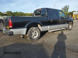 2003 Ford Super Duty F-250 XL with VIN 1FTNW20P63ED04454, listed as a Copart auction lot 86355444 with 154,194 mi miles and Salvage Title. Bid and sale history available at carsss.com. Image 3.