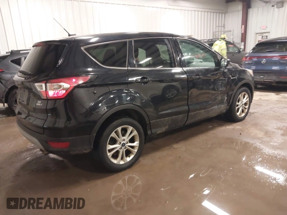 2017 Ford Escape SE with VIN 1FMCU9GD4HUC83761, listed as a IAAI auction lot 41487002 with 125,375 mi miles. Bid and sale history available at carsss.com. Image 4.