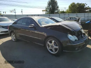 2003 Mercedes-Benz CLK 500 with VIN WDBTJ75JX3F039229, listed as a Copart auction lot 77006714 with 111,617 mi miles and Salvage Title. Bid and sale history available at DreamBid. Image 4.
