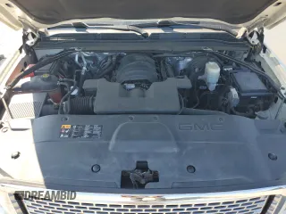 2015 GMC Yukon Denali with VIN 1GKS2CKJ3FR663324, listed as a Copart auction lot 70306614 with 154,234 mi miles and Salvage Title. Bid and sale history available at carsss.com. Image 13.