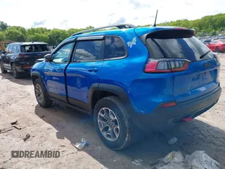 2020 Jeep Cherokee Trailhawk with VIN 1C4PJMBXXLD636547, listed as a IAAI auction lot 42314654 with 59,061 mi miles and . Bid and sale history available at DreamBid. Image 3.