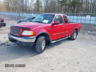 2003 Ford F-150 XL with VIN 2FTRX18L13CA49907, listed as a IAAI auction lot 41888674 with 132,944 mi miles. Bid and sale history available at carsss.com. Image 2.
