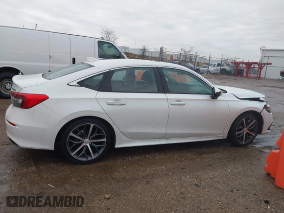 2023 Honda Civic Touring z VIN 2HGFE1F93PH304731, wystawiony jako IAAI lot #41675935 z przebiegiem 27 435 mil mil oraz . Historia ofert i sprzedaży dostępna na DreamBid. Obrazek 13.