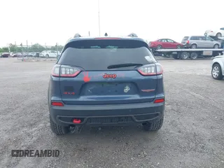 2019 Jeep Cherokee Trailhawk z VIN 1C4PJMBX1KD364100, wystawiony jako IAAI lot #42264518 z przebiegiem 117 020 mil mil oraz . Historia ofert i sprzedaży dostępna na DreamBid. Obrazek 16.