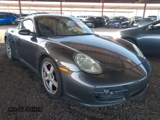 2007 Porsche Cayman S с VIN WP0AB29897U781381, выставлен на аукционе IAAI как лот 42115018 с пробегом Не указан миль и . История ставок и продаж доступна на DreamBid. Изображение 1.