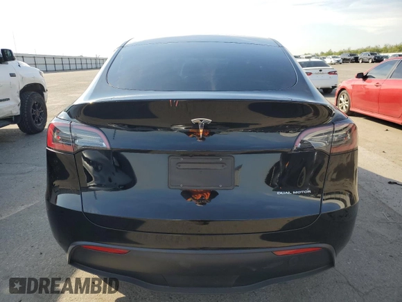 2023 Tesla Model Y Long Range with VIN 7SAYGDEE5PF834645, listed as a Copart auction lot 48596925 with 26,896 mi miles and Salvage Title. Bid and sale history available at DreamBid. Image 6.