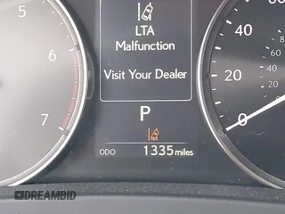 2024 Lexus IS 300 with VIN JTHCA1D29R5132121, listed as a IAAI auction lot 42084925 with 1,335 mi miles and . Bid and sale history available at DreamBid. Image 16.
