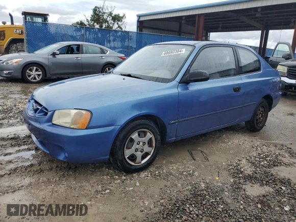 2001 Hyundai Accent z VIN KMHCF35G11U112976, wystawiony jako Copart lot #68692384 z przebiegiem 152 797 mil mil oraz Szkoda całkowita • Salvage title. Historia ofert i sprzedaży dostępna na DreamBid. Obrazek 1.