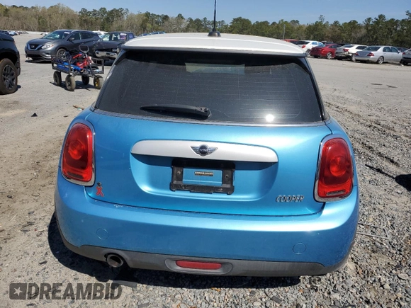 2015 MINI Hardtop with VIN WMWXM5C5XFT942679, listed as a Copart auction lot 49799655 with 79,072 mi miles and Salvage Title. Bid and sale history available at DreamBid. Image 6.