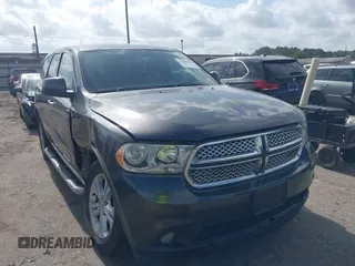 2013 Dodge Durango SXT with VIN 1C4RDHAG4DC686389, listed as a IAAI auction lot 42440260 with 166,952 mi miles and . Bid and sale history available at DreamBid. Image 1.