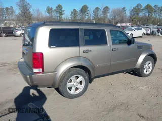 2007 Dodge Nitro SLT with VIN 1D8GU58K17W644847, listed as a IAAI auction lot 41462223 with 220,325 mi miles and . Bid and sale history available at carsss.com. Image 4.