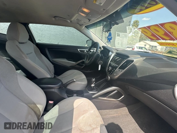 2012 Hyundai Veloster w/Gray Int с VIN KMHTC6AD6CU036826, выставлен на аукционе Copart как лот 48781135 с пробегом 169 498 миль миль и Чистый • Clean title. История ставок и продаж доступна на DreamBid. Изображение 5.
