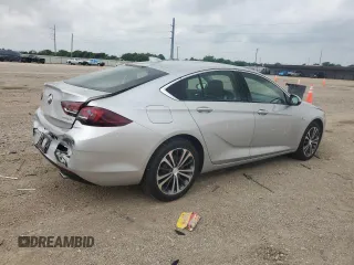 2018 Buick Regal Essence с VIN W04GP6SX8J1086932, выставлен на аукционе Copart как лот 54824185 с пробегом 69 473 миль миль и Списание • Salvage title. История ставок и продаж доступна на DreamBid. Изображение 3.