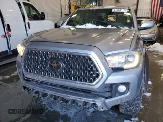 2018 Toyota Tacoma SR z VIN 3TMCZ5AN2JM122416, wystawiony jako Copart lot #41620015 z przebiegiem Nie podano mil oraz Szkoda całkowita • Salvage title. Historia ofert i sprzedaży dostępna na DreamBid. Obrazek 5.