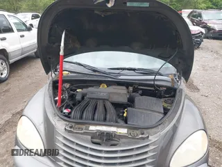 2001 Chrysler PT Cruiser with VIN 3C8FY4BB41T310213, listed as a IAAI auction lot 42070002 with 116,557 mi miles. Bid and sale history available at carsss.com. Image 9.