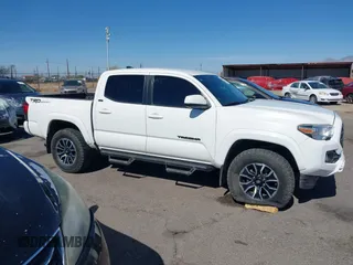 2021 Toyota Tacoma SR with VIN 3TYAX5GN5MT014868, listed as a IAAI auction lot 41549927 with 30,653 mi miles and . Bid and sale history available at DreamBid. Image 14.