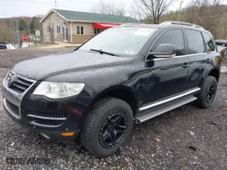 2008 Volkswagen Touareg 2 V6 with VIN WVGBE77L88D020743, listed as a IAAI auction lot 41958009 with 169,548 mi miles. Bid and sale history available at carsss.com. Image 2.