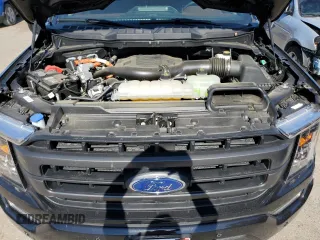 2023 Ford F-150 XL z VIN 1FTFW1ED9PFC82849, wystawiony jako Copart lot #57605605 z przebiegiem 22 823 mil mil oraz Szkoda całkowita • Salvage title. Historia ofert i sprzedaży dostępna na DreamBid. Obrazek 11.