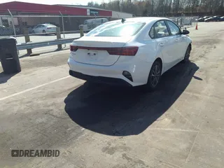 2023 Kia Forte LXS with VIN 3KPF24AD5PE637982, listed as a IAAI auction lot 41850509 with 27,495 mi miles and . Bid and sale history available at DreamBid. Image 4.